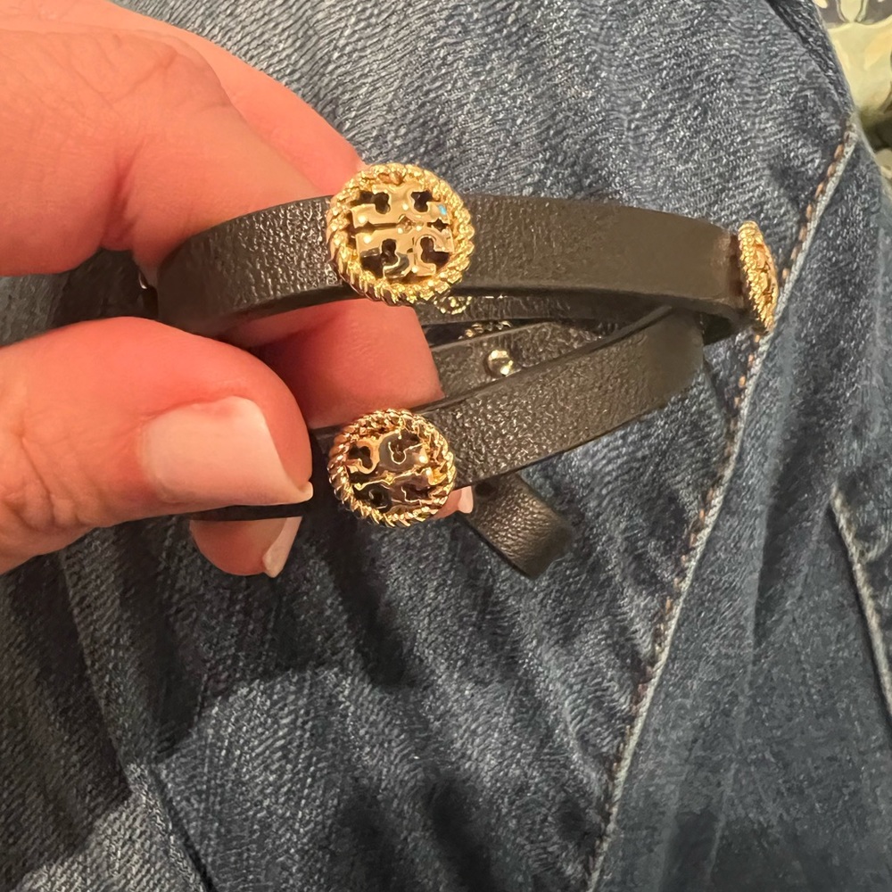 Leather Tory Burch metal logo gold wrap bracelet.